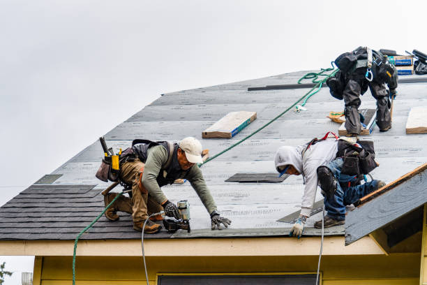 Professional Gutter Installation technician working in Saint Benedict, OR